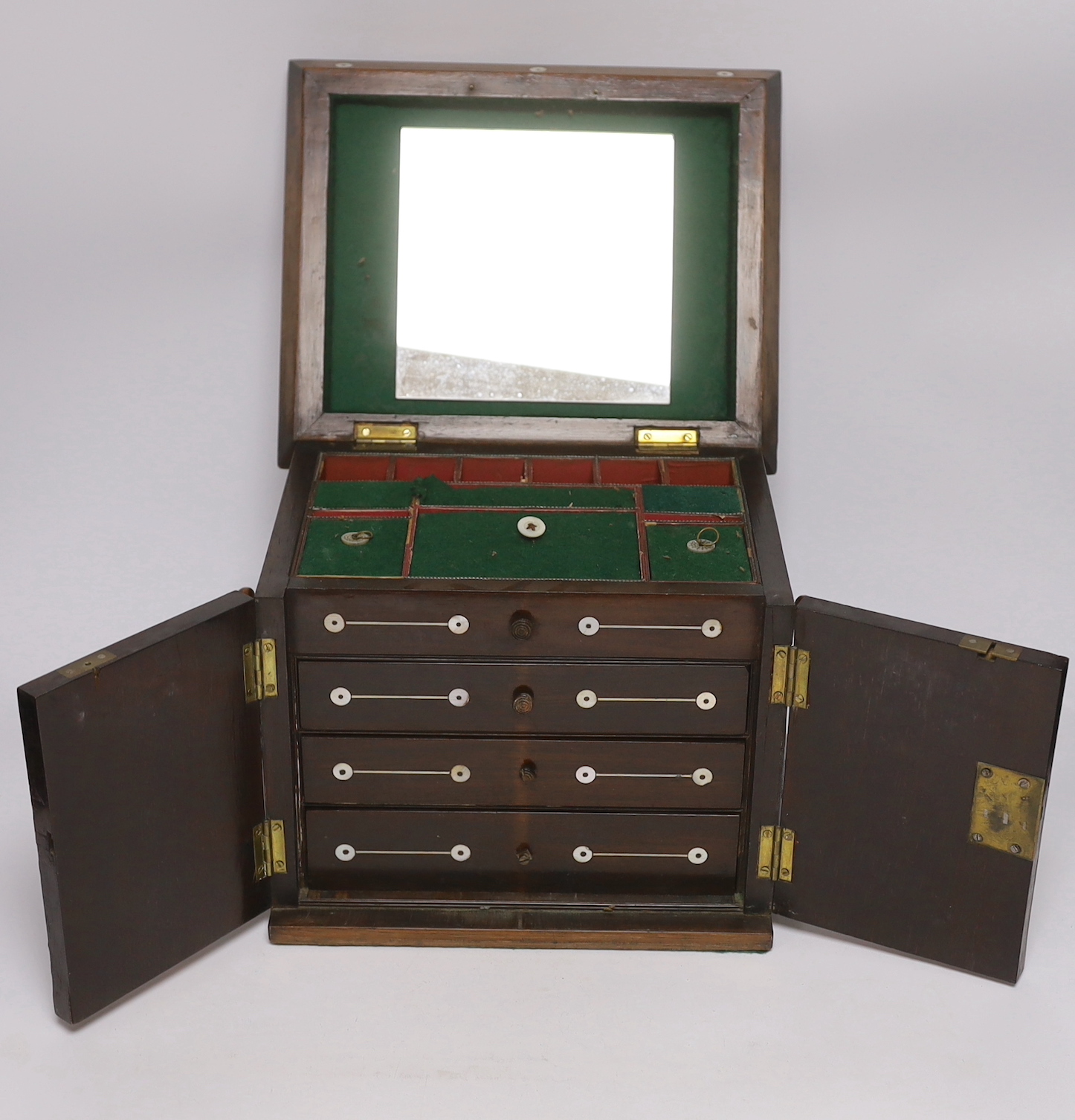 A William IV rosewood and cut mother of pearl table top sewing cabinet, 27cm, high, 28cm wide, 23.5cm deep